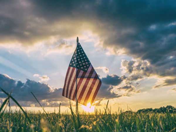 american flag morning sun